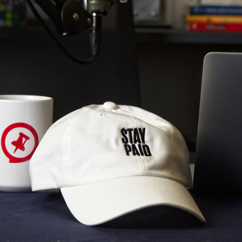 Black Stay Paid Logo on White Hat