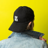 White Stay Paid Logo on Black Hat
